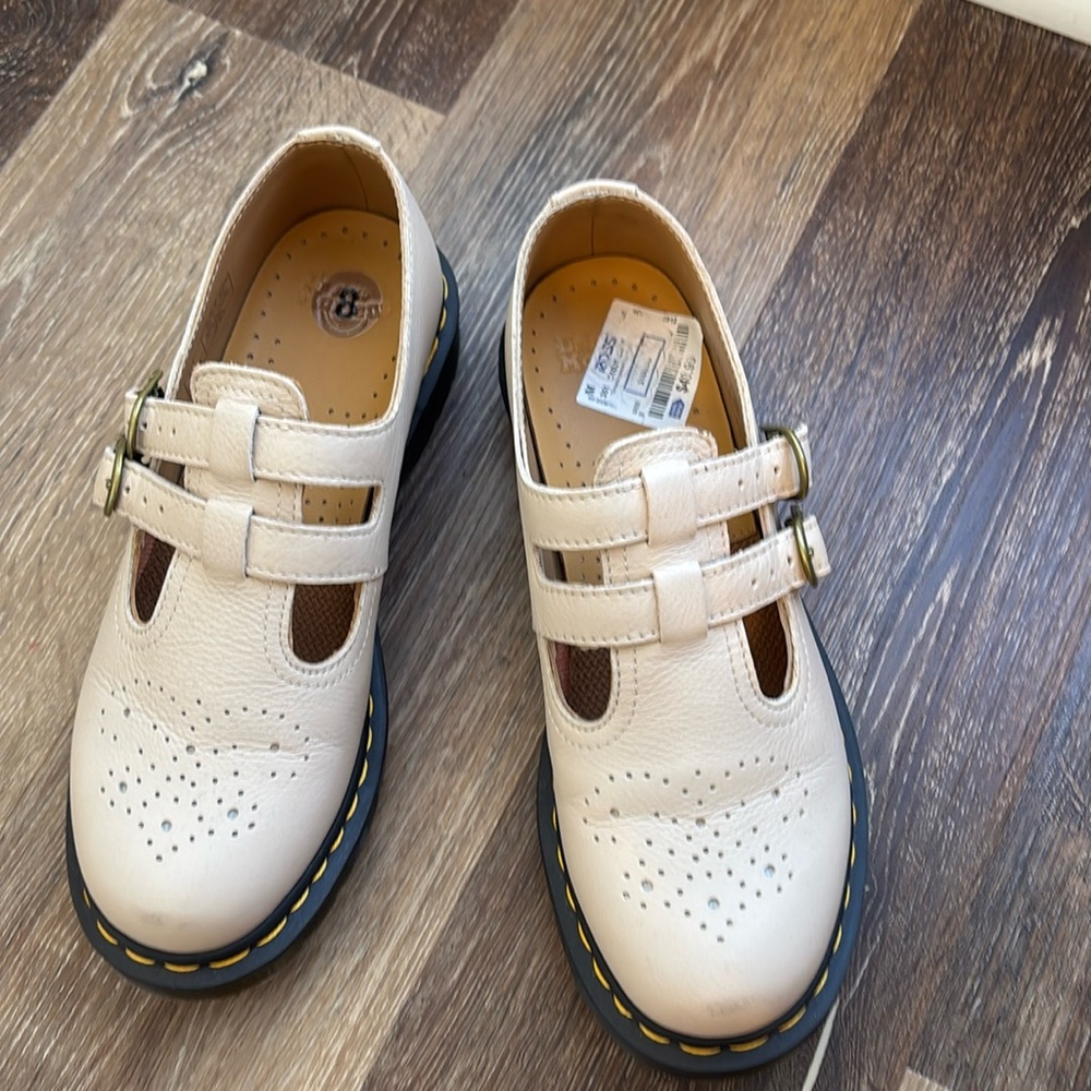 Women’s Dr. Martens Tan Mary Jane shoes.